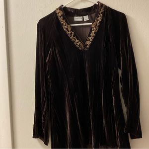 This is a Chicos blouse it’s for women size 0 color: Brown